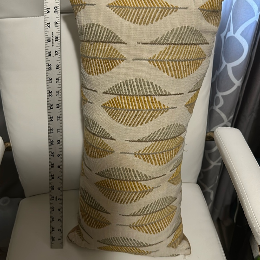 Throw pillows 11 inches by 22 inches.